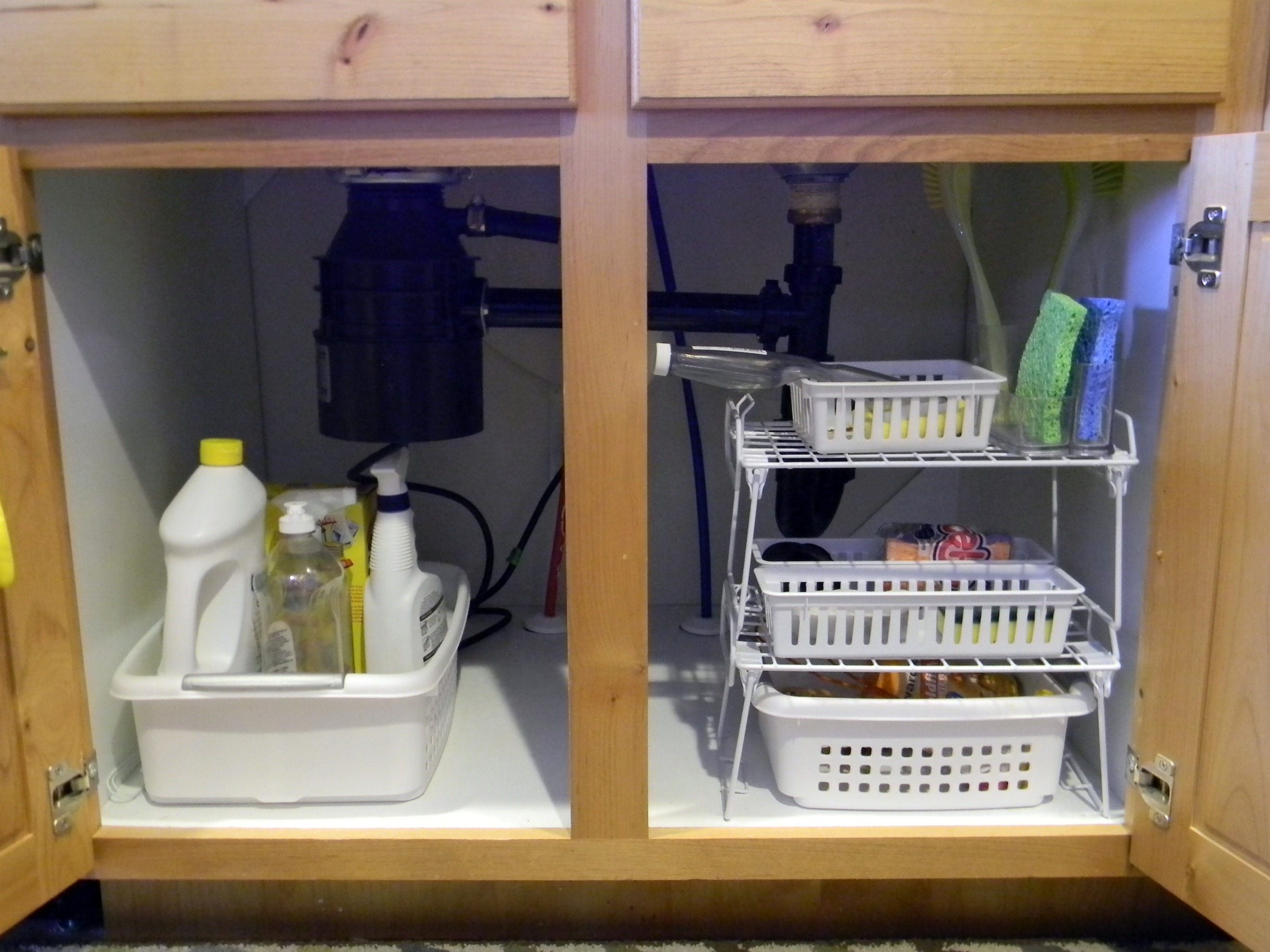 organization idea for under the kitchen sink