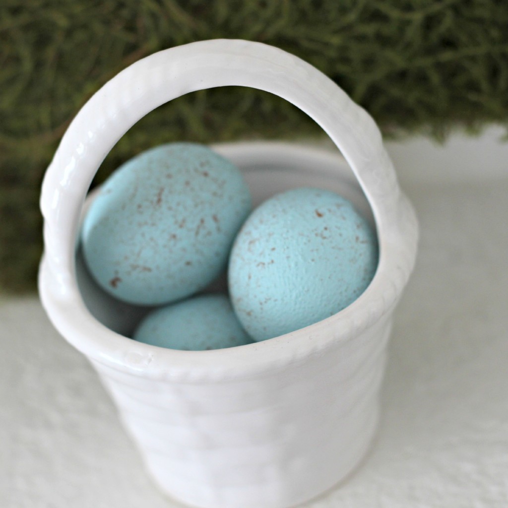 Green and White Easter Mantel basket with eggs .1