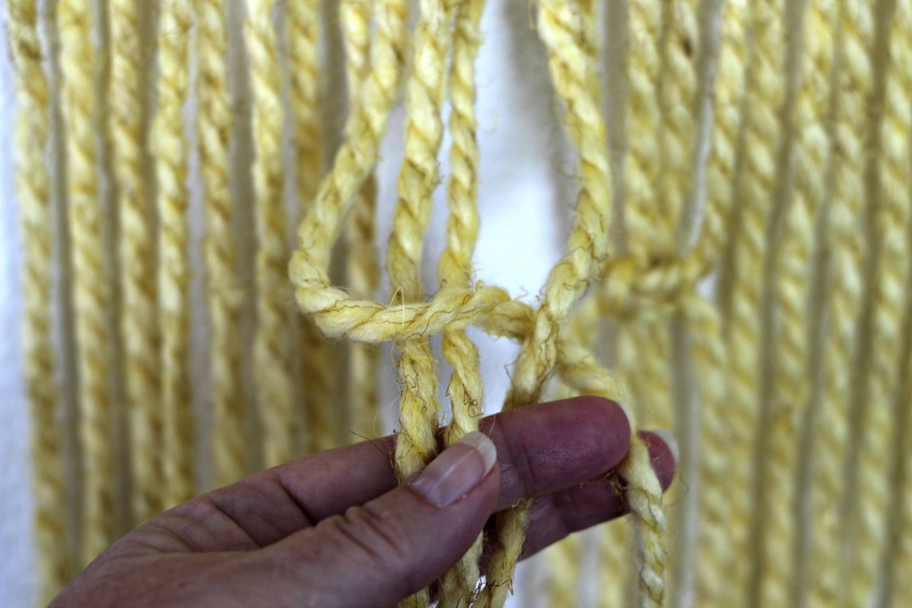 Macrame Wall Hanging making a square knot.1