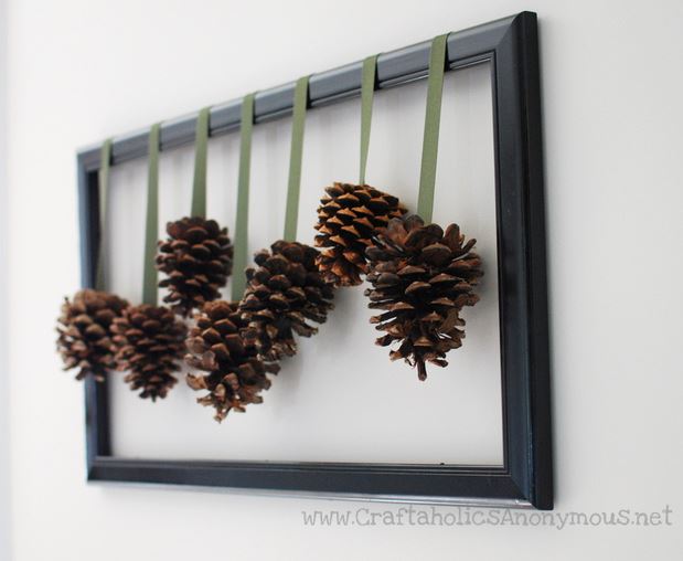 pinecones hanging from frame