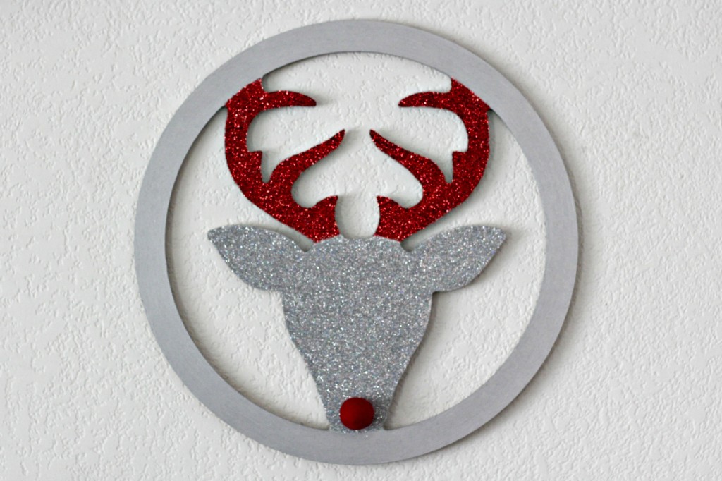 Red and Black Mantel hanging deer