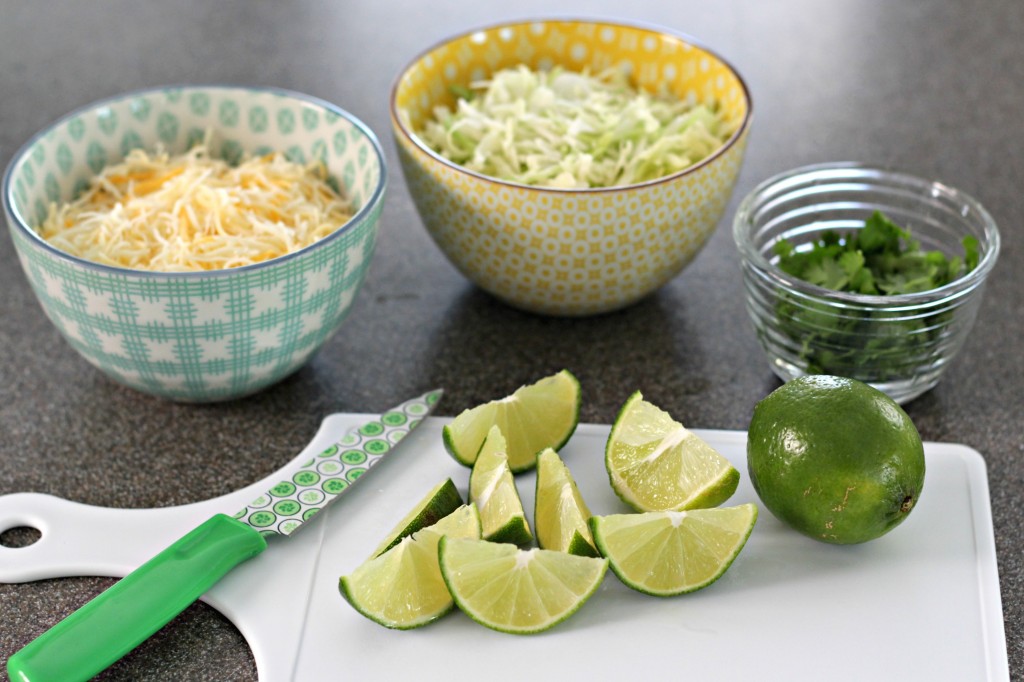 3-ingredient-pork-tacos-limes-cheese-cabbage-cilantro