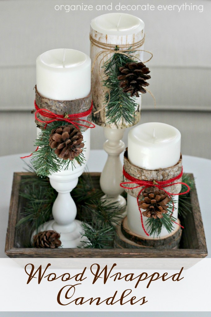 wood-wrapped-candles-with-pine-accents-for-christmas-decor