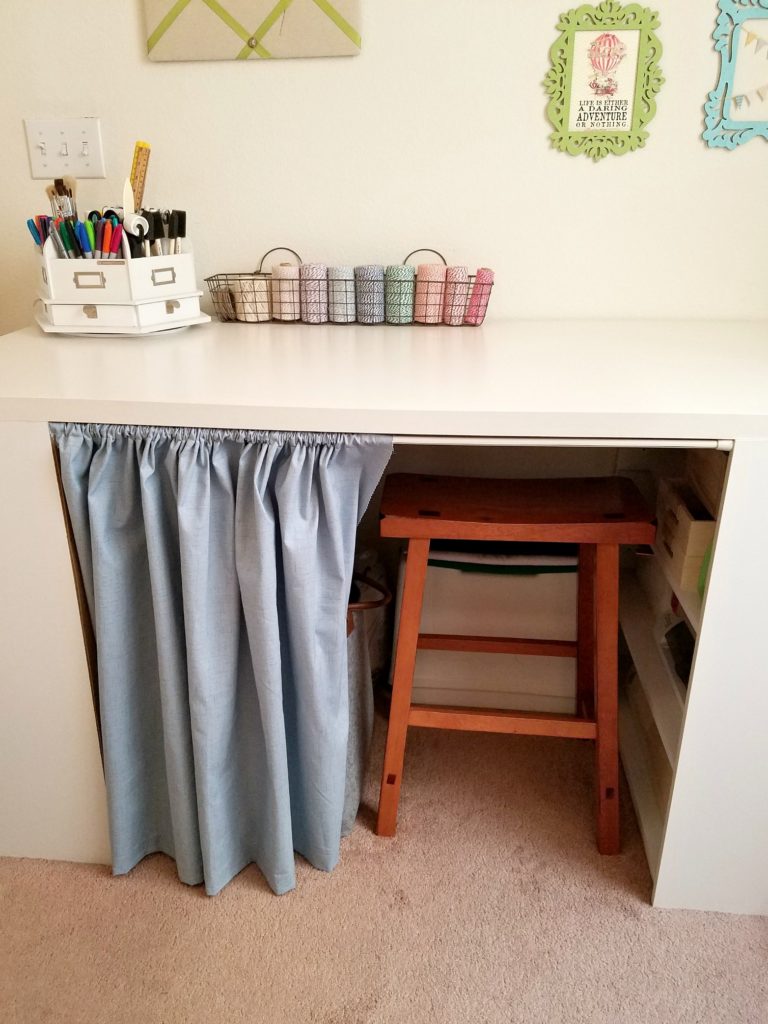 Craft table with curtain and stool