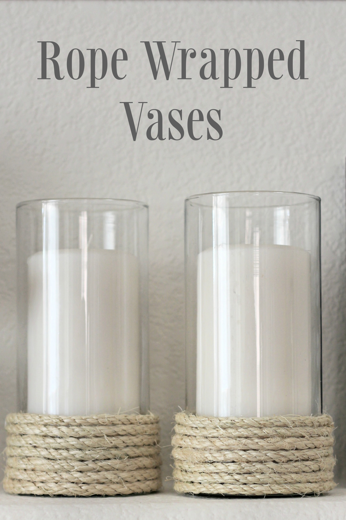 Various sized vases outlets wrapped in rope