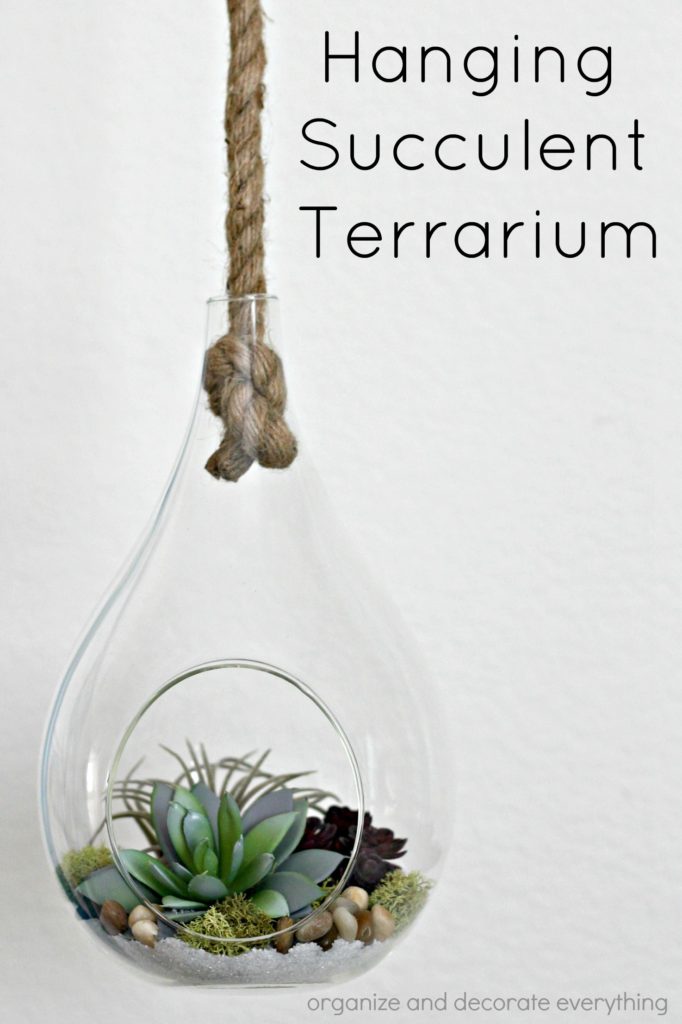 Hanging faux succulent terrarium