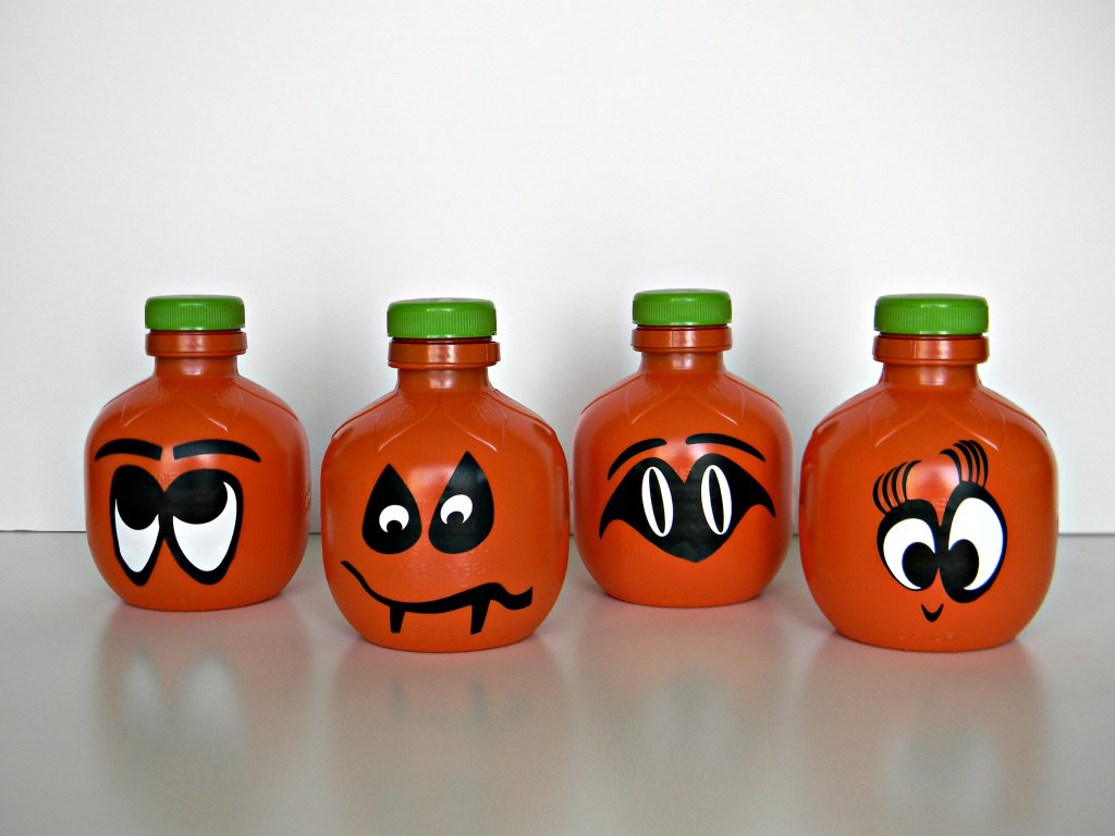 candy filled pumpkins in a row