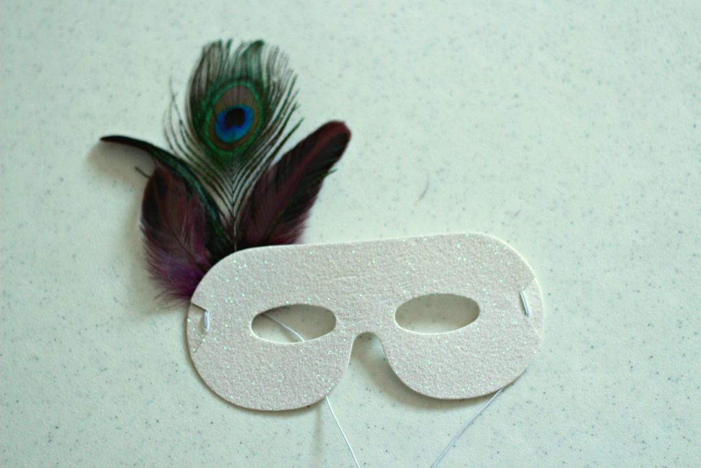 masquerade mask with feathers