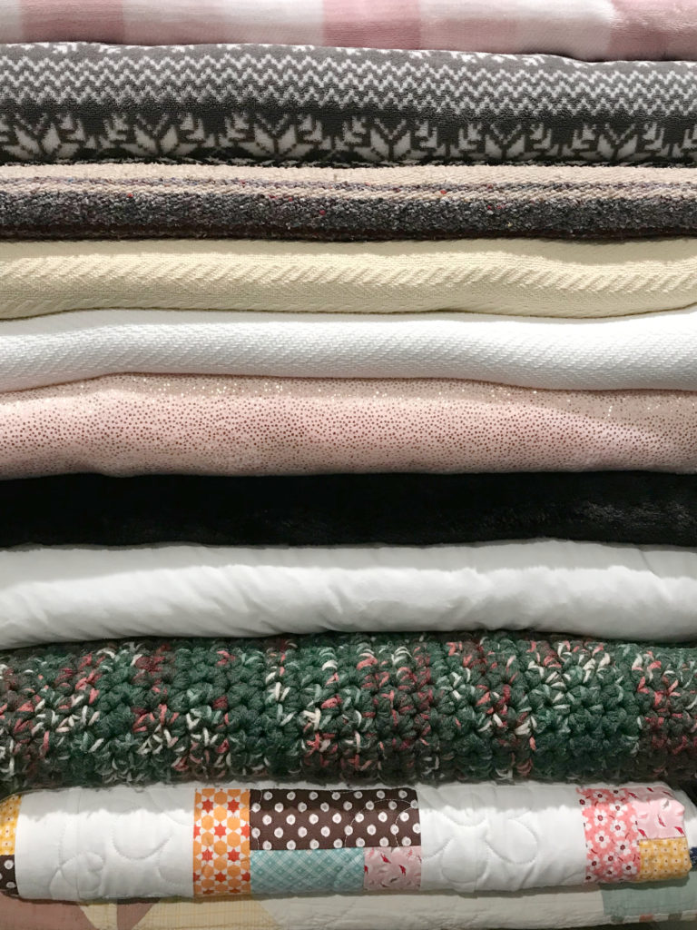 closet organized blankets