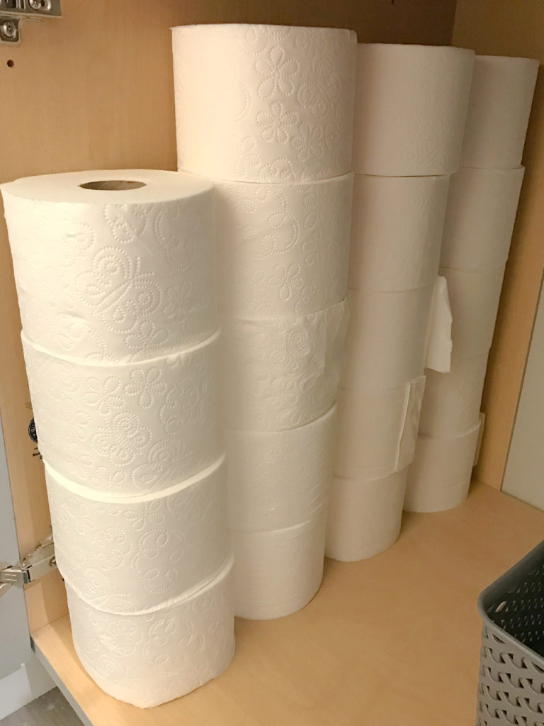 toilet paper under the sink